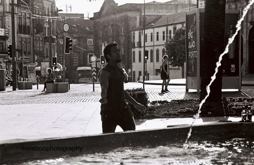 young man dancing in street